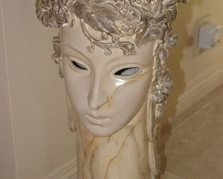 Ceramic plant stand.