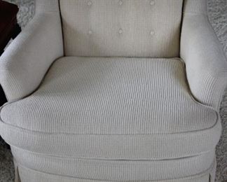 One of two club chairs.