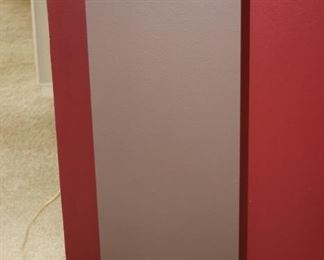 Tall stand with light inside.