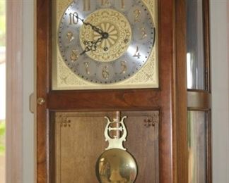 Howard Miller triple chime wall clock.