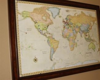 Framed magnetic world map with markers.