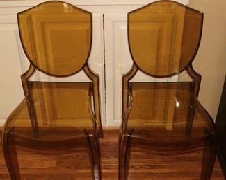 Two Lucite chairs