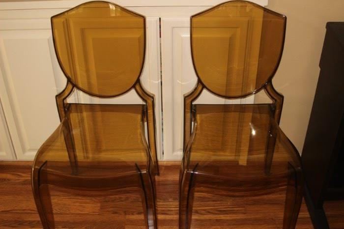 Two Lucite chairs