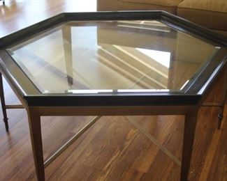 Six sided glass and wood Asian themed coffee table.