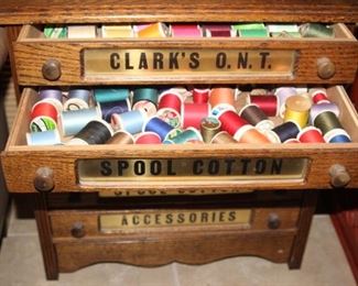 Sewing accessories storage drawers. Full of sewing notions.