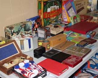 Tables filled with board games and playing cards.
