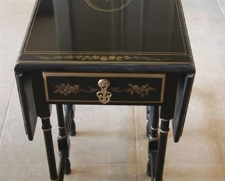 Drop leaf Asian themed end table.