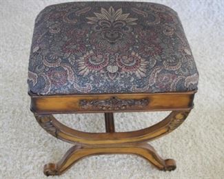 Nicely upholstered foot stool.