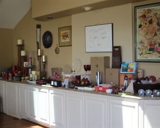 Bar items, candles, tribal masks, Christmas and art.