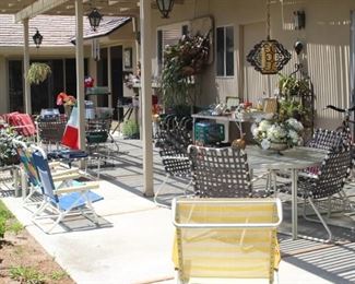 Beach chairs, picnic supplies, tools, hanging lights, silk arrangements, flags and vases.