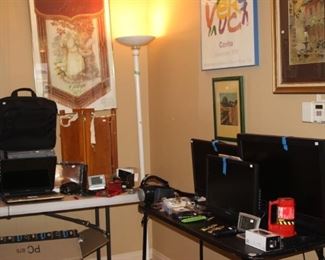 Three TVs, Toshiba laptop, radios, clocks and art easel set.