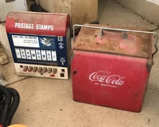 Vintage postage stamp machine and vintage Coca Cola drink cooler
