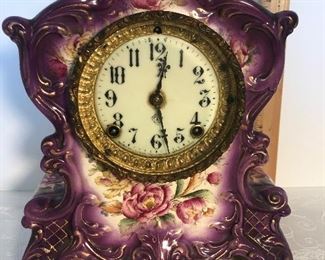 Lot 1D, Ansonia Wyoming porcelain clock, currently not working, rare purple color, $120