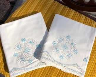 85D, Set of new embroidered pillowcases, $8