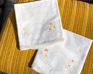 97D, Set of new embroidered pillowcases, $8