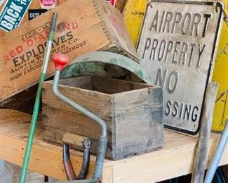 wooden ammunition boxes and old signs