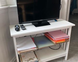 Small TV and bookshelf