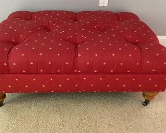 Upholstered ottoman $95
