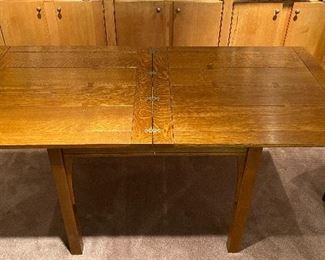 20% off of $1095 Stickley flip top table - flips square to half its size