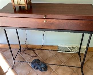 Chest on metal stand