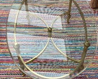 $125 oval glass top brass table