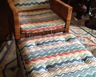 One of two matching arm chairs with ottoman