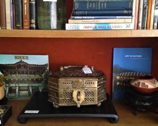 More books; brass box