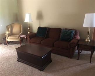 Nice clean couches, coffee table, wingback chairs and end tables!