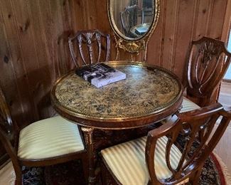 Art work, decorative antique mirror, high end table and chair set, circular rug 