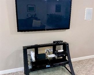 flat screen TV and TV stand