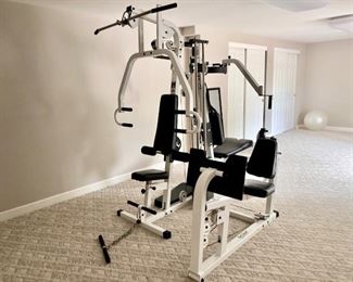 Home gym fitness center weight machine with leg attachments