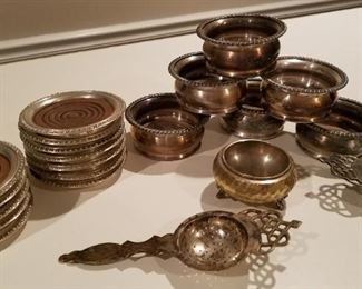 Silver plate coasters and tea strainers