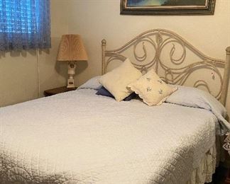 Full Size Bed with Wrought Iron Headboard,  Antique Lamp