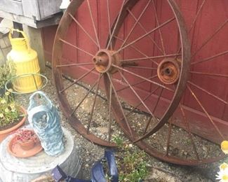 milk cans, planters, old wagon wheels