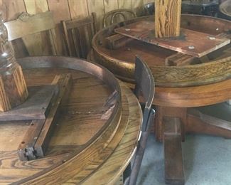 lots of round oak tables