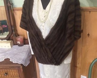 mink and dresses on forms