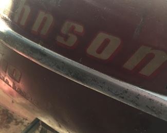 old Johnson outboard with fuel can