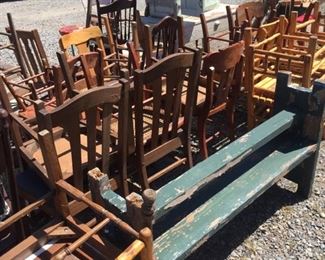 the bevy of oak chairs and old benches