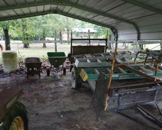 Utility Trailer, ladders, John Deere fertilizer buggy, Wheel barrow.