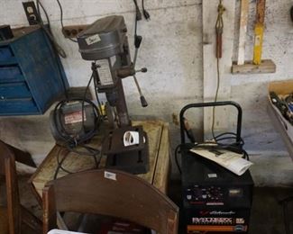 Schumcher SC4020 battery charger, Drill press, Dayton 1/3 hp grinder, blue storage cabinet