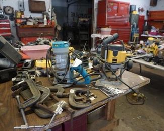 Various clamps including a Wilson #110 C Clamp Deep Forged, Makita Router, Dewalt deep plunge router,