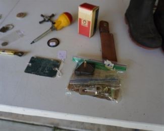 Schrader Wet stone, clock parts, advertising box, rubber boots