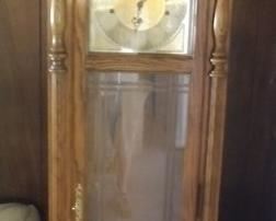 Howard Miller Grandfather Clock (B) 22.5" by 79.5" by 12" Asking $400.00