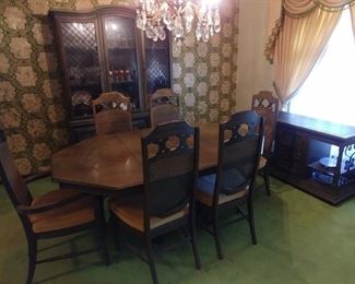Retro Dining Room Suite: Dining Table with (2) Leaves 12" each 68" with Leaves by 34", (1) Arm Chairs, (5) Armless Chairs. Asking $275.00 China Cabinet 55" by 78.5" by 17". Asking $200.00 and Buffet 48" by 20.5" by 28.5" Asking $175.00