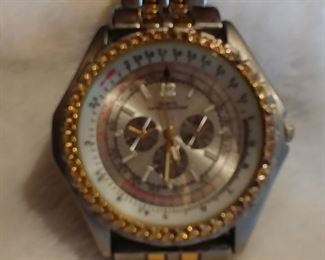 8. Gold & Silver Watch with 4 Dials Made in China Asking $25.00