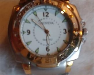 15. Geneva Quartz White Dial 2 Tone Finish Gold/Silver Asking $29.00