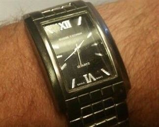 19. Suisse Echnik Quartz Men's Watch Asking $39.00