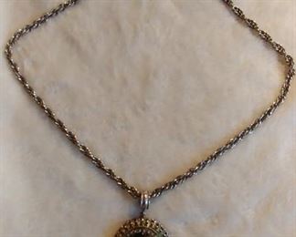 8. Oval Medallion with Silver Chain Necklace Asking $25.00