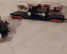 Franklin Mint 1932 Ford Convertible Sedan Asking $65.00 (left), Hawthorn Village Model T Truck with Rail Car Asking $35.00 (middle), Hawthorn Village Model T Runabout with Rail Car Asking $35.00 (right)