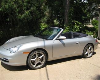 2003 Porsche Carrera 4 Cabriolet Convertible with 23,007 miles, in a gorgeous Arctic Silver Metallic with Metropol Blue leather interior